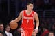 Houston Rockets guard Jeremy Lin dribbles during the first half of an NBA basketball game against the Los Angeles Lakers, Tuesday, April 8, 2014, in Los Angeles. (AP Photo/Mark J. Terrill)