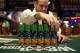 Dealer Omar Abu-Eid adjusts a stack of chips before the first day of the World Series of Poker main event Saturday, July 5, 2014, in Las Vegas. Players are vying for the $10 million first-place payout at the poker tournament. (AP Photo/John Locher)