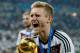 RIO DE JANEIRO, BRAZIL - JULY 13: Andre Schuerrle celebrates with the World Cup trophy after defeating Argentina 1-0 in extra time during the 2014 FIFA World Cup Brazil Final match between Germany and Argentina at Maracana on July 13, 2014 in Rio de Janeiro, Brazil. (Photo by Matthias Hangst/Getty Images)