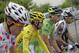 France's Cyril Lemoine, wearing the best climber's dotted jersey, Italy's Vincenzo Nibali, wearing the overall leader's yellow jersey, Peter Sagan of Slovakia, wearing the best sprinter's green jersey, and France's Blel Kadri lead the pack during the ceremonial procession prior to the start of the eighth stage of the Tour de France cycling race over 161 kilometers (100 miles) with start in Tomblaine and finish in Gerardmer, France, Saturday, July 12, 2014. (AP Photo/Laurent Cipriani)