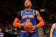 TORONTO, CANADA - April 11: Carmelo Anthony #7 of the New York Knicks attempts a free throw against the Toronto Raptors on April 11, 2014 at the Air Canada Centre in Toronto, Ontario, Canada. NOTE TO USER: User expressly acknowledges and agrees that, by downloading and or using this Photograph, user is consenting to the terms and conditions of the Getty Images License Agreement. Mandatory Copyright Notice: Copyright 2014 NBAE (Photo by Ron Turenne/NBAE via Getty Images)