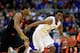 KANSAS CITY, MO - MARCH 13: Andrew Wiggins #22 of the Kansas Jayhawks drives upcourt as Marcus Smart #33 of the Oklahoma State Cowboys defends during the Big 12 Basketball Tournament quarterfinal game at Sprint Center on March 13, 2014 in Kansas City, Missouri. (Photo by Jamie Squire/Getty Images)