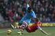 Tottenham Hotspur's Emmanuel Adebayor, left, is tackled by Southampton's Calum Chambers during their English Premier League soccer match at St Mary's stadium, Southampton, England, Sunday, Dec. 22, 2013. (AP Photo/Sang Tan)