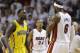 Indiana Pacers guard Lance Stephenson (1) and Miami Heat forward LeBron James (6) exchange words on the court during the first half Game 6 in the NBA basketball playoffs Eastern Conference finals on Friday, May 30, 2014, in Miami. (AP Photo/Lynne Sladky)