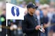 Tiger Woods of the US holds his scorecard after putting on the 11th green during a practice round ahead of the British Open Golf championship at the Royal Liverpool golf club, Hoylake, England, Tuesday July 15, 2014. The British Open Golf championship starts on Thursday July 17. (AP Photo/Peter Morrison)