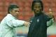 Chelsea's coach Jose Mourinho, left, and striker Didier Drogba, right, gesture during a training session in Paris, Monday Sept. 13, 2004. Chelsea are preparing for the Champions Leagues soccer match against Paris Saint Germain, Tuesday Sept. 14.(AP Photo/Michel Euler)