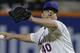 New York Mets pitcher Bartolo Colon (40) delivers against the Atlanta Braves in the sixth inning of a baseball game, Thursday, July 10, 2014, in New York. (AP Photo/Julie Jacobson)