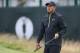 Tiger Woods of the US watches his shot on the 4th hole during a practice round ahead of the British Open Golf championship at the Royal Liverpool golf club, Hoylake, England, Tuesday July 15, 2014. The British Open starts on Thursday July 17. (AP Photo/Peter Morrison)
