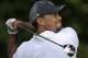 Tiger Woods tees off on the 14th hole during the second round of the Quicken Loans National PGA golf tournament, Friday, June 27, 2014, in Bethesda, Md. (AP Photo/Patrick Semansky)