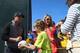 Rory McIlroy signs for fans on practice day.