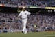 American League shortstop Derek Jeter, of the New York Yankees, waves as he is taken out of the game in the top of the fourth inning of the MLB All-Star baseball game, Tuesday, July 15, 2014, in Minneapolis. (AP Photo/Jeff Roberson)