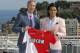 Soccer player Radamel Falcao of Colombia, right, holding up his new shirt during his official presentation after signing for AS Monaco,poses with sports director of AS Monaco Vadim Vasilyed, Tuesday, July 9, 2013, in Monaco. (AP Photo/Lionel Cironneau)