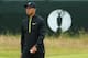 HOYLAKE, ENGLAND - JULY 15: Tiger Woods of the United States walks across a green during a practice round prior to the start of The 143rd Open Championship at Royal Liverpool on July 15, 2014 in Hoylake, England. (Photo by Andrew Redington/Getty Images)