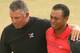 Tiger Woods, overcome with emotion, is comforted by caddie Steve Williams after winning the 2006 British Open.