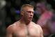 FILE - In this Nov. 15, 2008 file photo, Brock Lesnar reacts during his win over Randy Couture for the UFC World Heavyweight Mixed Martial Arts championship match in Las Vegas. Lesnar won by TKO in the second round. Lesnar has withdrawn from his upcoming title defense against Shane Carwin because of an illness. Lesnar was scheduled to fight Carwin in the main event of UFC 106 on Nov. 21 at the Mandalay Bay Events Center in Las Vegas. (AP Photo/Eric Jamison)