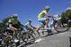 Italy's Vincenzo Nibali, wearing the overall leader's yellow jersey, right, Denmark's Jakob Fuglsang, center rear, and Netherland's Steven Kruijswijk, left, climb during the eleventh stage of the Tour de France cycling race over 187.5 kilometers (116.5 miles) with start in Besancon and finish in Oyonnax, France, Wednesday, July 16, 2014. (AP Photo/Laurent Cipriani)