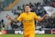 Verona's Juan Manuel Iturbe celebrates after scoring, during a Serie A soccer match between Udinese and Verona at the Friuli Stadium in Udine, Italy, Monday, Jan. 6, 2014. (AP Photo/Paolo Giovannini)