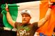BOSTON, MA - AUGUST 17: Conor McGregor celebrates following his win against Max Holloway in their featherweight bout at TD Garden on August 17, 2013 in Boston, Massachusetts. (Photo by Jared Wickerham/Getty Images)