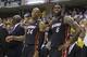 Miami Heat guard Ray Allen (34) and forward LeBron James stand on the bench in the closing seconds of a 93-90 loss to the Indiana Pacers in Game 5 of the NBA basketball Eastern Conference finals in Indianapolis, Wednesday, May 28, 2014. The Heat lead the series 3-2. (AP Photo/Michael Conroy)