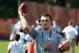 Cleveland Browns' Johnny Manziel throws a pass during an NFL football Play 60 youth event at the Cleveland Browns practice facility Friday, June 27, 2014, in Berea, Ohio. The AFC rookies took part in the NFL's annual Rookie Symposium. (AP Photo/Aaron Josefczyk)