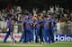 SHARJAH, UNITED ARAB EMIRATES - DECEMBER 08: Afghanistan celebrate during the Twenty20 match between Afghanistan and Pakistan at the Sharjah Cricket Stadium on December 8, 2013 in Sharjah, United Arab Emirates. (Photo by Francois Nel/Getty Images)