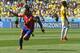 Chile's Alexis Sanchez celebrates after scoring his side's first goal during the World Cup round of 16 soccer match between Brazil and Chile at the Mineirao Stadium in Belo Horizonte, Brazil, Saturday, June 28, 2014. (AP Photo/Manu Fernandez)