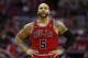 Chicago Bulls forward Carlos Boozer (5) stands on the court during a break in the action during the first half of Game 4 of an opening-round NBA basketball playoff series against the Washington Wizards in Washington, Sunday, April 27, 2014. (AP Photo/Alex Brandon)