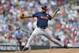 World pitcher Edwin Escobar delivers during the third inning of the All-Star Futures baseball game against the United States, Sunday, July 13, 2014, in Minneapolis. (AP Photo/Jeff Roberson)