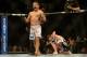 Apr 20, 2013; San Jose, CA, USA; Chad Mendes (left) celebrates after defeating Darren Elkins (right) during the featherweight bout prelims of the UFC on Fuel TV at HP Pavilion. Mandatory Credit: Kyle Terada-USA TODAY Sports