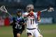 BOSTON, MA - JUNE 26: Steven Denapoli #70 defends against Paul Rabil #11 of Team USA in the fourth quarter during the 2014 MLL All Star Game at Harvard Stadium on June 26, 2014 in Boston, Massachusetts. (Photo by Jim Rogash/Getty Images)