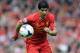 Liverpool's Luis Suarez during their English Premier League soccer match against Newcastle United at Anfield in Liverpool, England, Sunday May 11, 2014. (AP Photo/Clint Hughes)