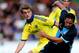 HIGH WYCOMBE, ENGLAND - JULY 16: Sam Wood of Wycombe holds off the challenge of Marco van Ginkel of Chelsea duing the pre season friendly match between Wycombe Wanderers and Chelsea at Adams Park on July 16, 2014 in High Wycombe, England. (Photo by Ben Hoskins/Getty Images)