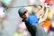 Rory McIlroy of Northern Ireland plays a shot off the 4th tee during the first day of the British Open Golf championship at the Royal Liverpool golf club, Hoylake, England, Thursday July 17, 2014. (AP Photo/Scott Heppell)