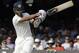 India's Ajinkya Rahane plays a shot off the bowling of England's Liam Plunkett during the first day of the second test match between England and India at Lord's cricket ground in London, Thursday, July 17, 2014. (AP Photo/Kirsty Wigglesworth)