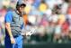Rory McIlroy of Northern Ireland watches his shot off the 4th tee during the first day of the British Open Golf championship at the Royal Liverpool golf club, Hoylake, England, Thursday July 17, 2014. (AP Photo/Scott Heppell)
