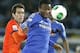 Chelsea FC's John Obi Mikel, right, fights for the ball with CF Monterrey's Cesar Delgado during their semifinal match at the FIFA Club World Cup soccer tournament in Yokohama, near Tokyo, Thursday, Dec. 13, 2012. (AP Photo/Shizuo Kambayashi)