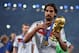 RIO DE JANEIRO, BRAZIL - JULY 13: Sami Khedira of Germany celebrates with the World Cup trophy after defeating Argentina 1-0 in extra time during the 2014 FIFA World Cup Brazil Final match between Germany and Argentina at Maracana on July 13, 2014 in Rio de Janeiro, Brazil. (Photo by Matthias Hangst/Getty Images)