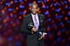 Sportscaster Stuart Scott accepts the Jimmy V award for perseverance, at the ESPY Awards at the Nokia Theatre on Wednesday, July 16, 2014, in Los Angeles. (Photo by John Shearer/Invision/AP)