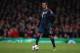 Bayern's Thiago Alcantara takes the ball forward during a Champions League, round of 16, first leg soccer match between Arsenal and Bayern Munich at the Emirates stadium in London, Wednesday, Feb. 19, 2014 .(AP Photo/Alastair Grant)