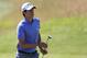 Matteo Manassero of Italy prepares to putt on the 13th green during the first day of the British Open Golf championship at the Royal Liverpool golf club, Hoylake, England, Thursday July 17, 2014. (AP Photo/Scott Heppell)