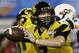 Missouri quarterback Maty Mauk (7) rolls back to pass against Oklahoma State during the second half of the Cotton Bowl NCAA college football game, Friday, Jan. 3, 2014, in Arlington, Texas. (AP Photo/Tim Sharp)