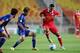 SUWON, SOUTH KOREA - MAY 22: Zakaria Bakkali of PSV Eindhoven competes for the ball with Seo Jung-Jin of Suwon Samsung Bluewings during the friendly match between PSV Eindhoven and Suwon Samsung Bluewings at Suwon Worldcup Stadium on May 22, 2014 in Suwon, South Korea. (Photo by Chung Sung-Jun/Getty Images)