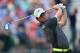 HOYLAKE, ENGLAND - JULY 18: Rory McIlroy of Northern Ireland watches his tee shot on the fourth hole during the second round of The 143rd Open Championship at Royal Liverpool on July 18, 2014 in Hoylake, England. (Photo by Stuart Franklin/Getty Images)
