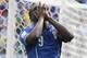 Italy's Mario Balotelli reacts after missing a chance during the group D World Cup soccer match between Italy and Costa Rica at the Arena Pernambuco in Recife, Brazil, Friday, June 20, 2014. (AP Photo/Frank Augstein)