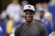 Indianapolis Colts' Reggie Wayne watches as the Indianapolis Colts warm up before an NFL football game against the Tennessee Titans Sunday, Dec. 1, 2013, in Indianapolis. (AP Photo/AJ Mast)