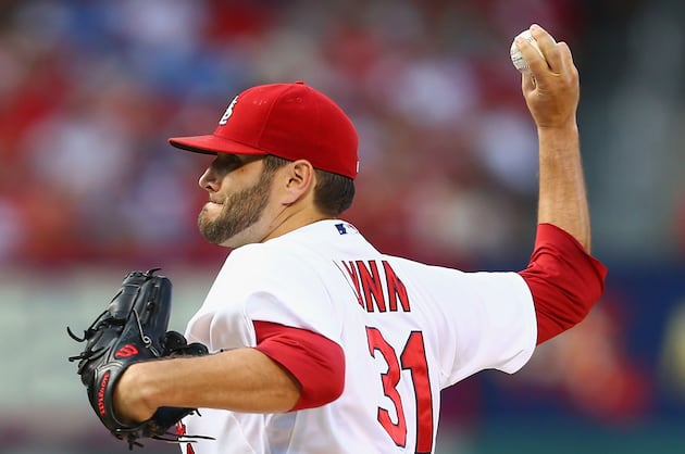 Cards Take Opener Behind Lynn, Holliday : Sports
