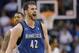 Minnesota Timberwolves forward Kevin Love (42) yells after hitting a three pointer against the Phoenix Suns during the second half of an NBA basketball game, Tuesday, Feb. 25, 2014, in Phoenix. (AP Photo/Matt York)