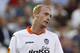 Valencia's Jeremy Mathieu from France, looks toward the ground after failing to score against against Swansea City during their Europa League Group A soccer match at the Mestalla stadium in Valencia, Spain, Thursday , Sept. 19, 2013. (AP Photo/Alberto Saiz)