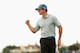 HOYLAKE, ENGLAND - JULY 19: Rory McIlroy of Northern Ireland celebrates holing an eagle putt on the 16th green during the third round of The 143rd Open Championship at Royal Liverpool on July 19, 2014 in Hoylake, England. (Photo by Mike Ehrmann/Getty Images)