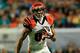 MIAMI GARDENS, FL - OCTOBER 31: Marvin Jones #82 of the Cincinnati Bengals runs with ball against the Miami Dolphins at Sun Life Stadium on October 31, 2013 in Miami Gardens, Florida. (Photo by Chris Trotman/Getty Images)